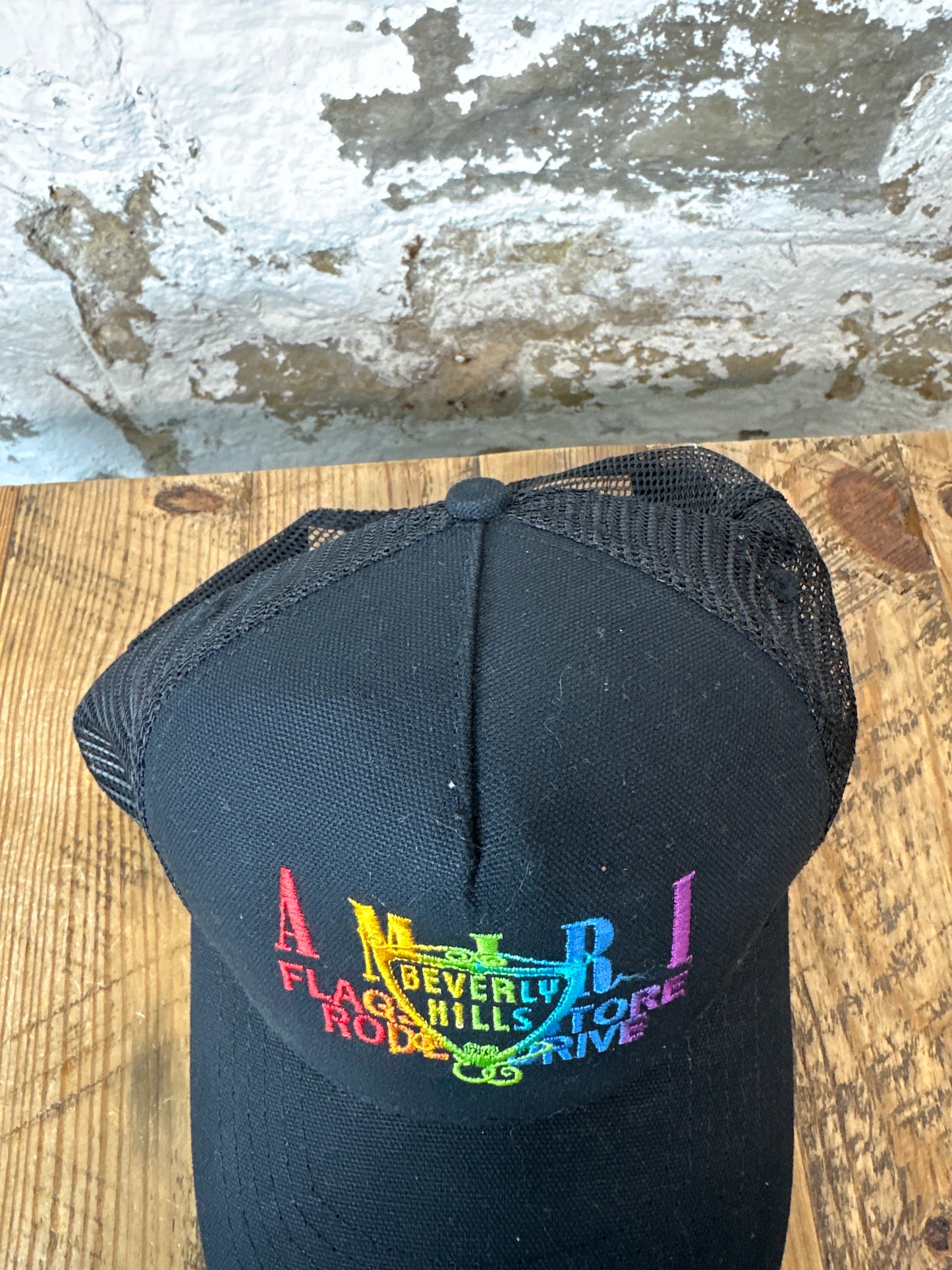 Amiri Black Rainbow Flagship Trucker Hat