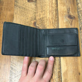 Gucci Black Embossed Monogram Bifold Wallet