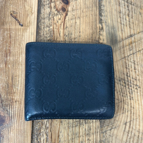 Gucci Embossed Monogram Black Bifold Wallet