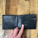 Gucci Black Embossed Bifold Wallet